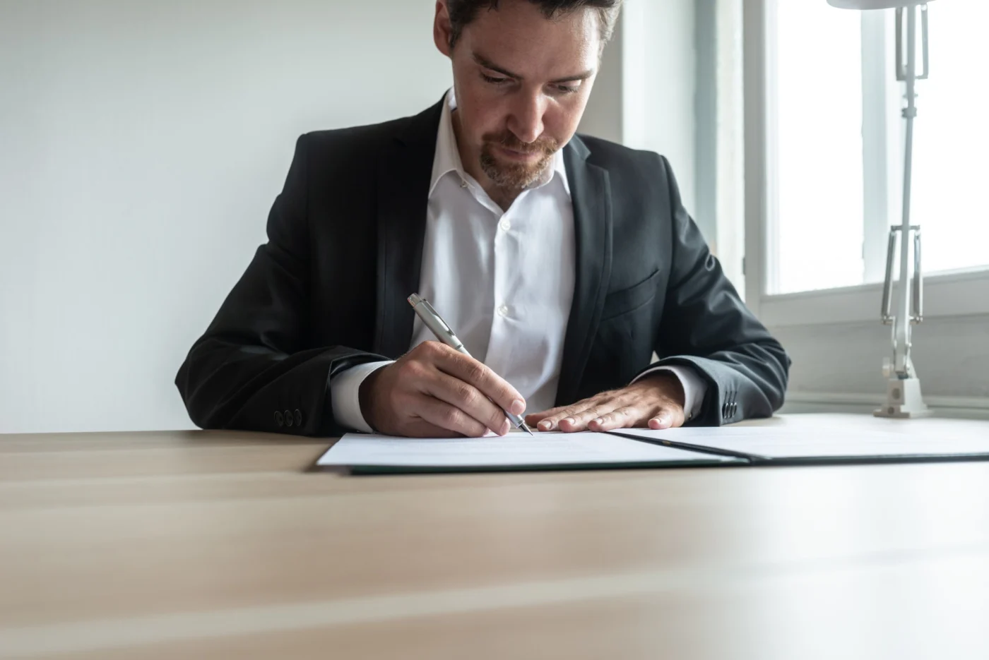 An independent professional signing a B2B services contract