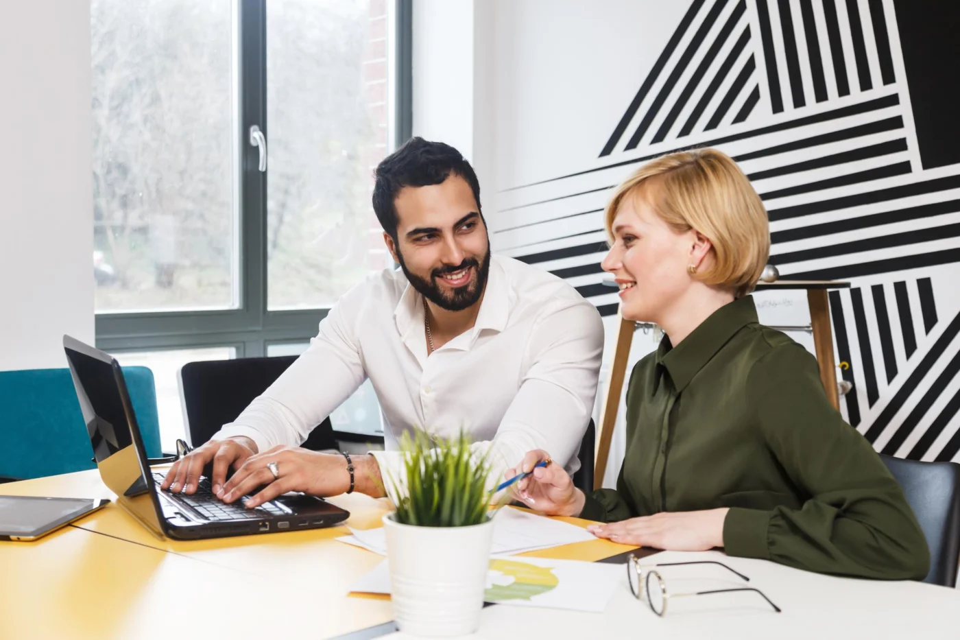 A solo professional in a B2B client meeting, presenting to a hiring manager