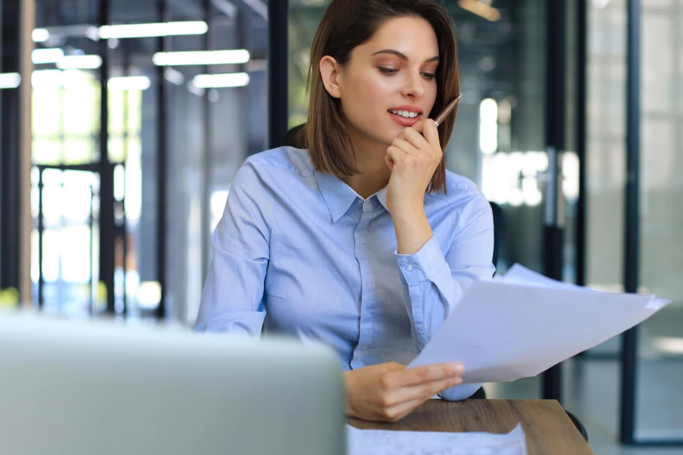 A procurement lead reviewing a supplier contract