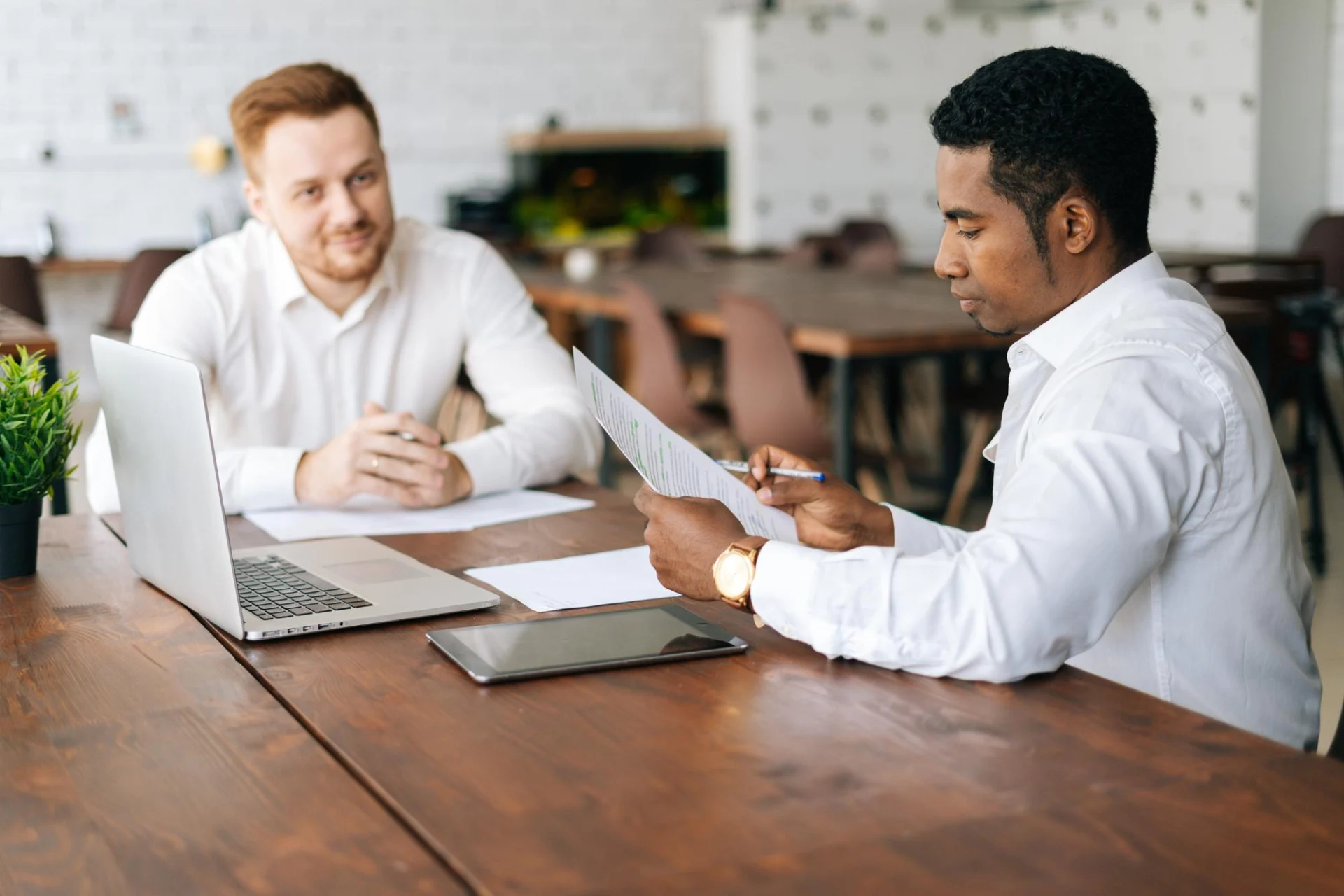 A client business and an independent supplier working through the terms of an engagement
